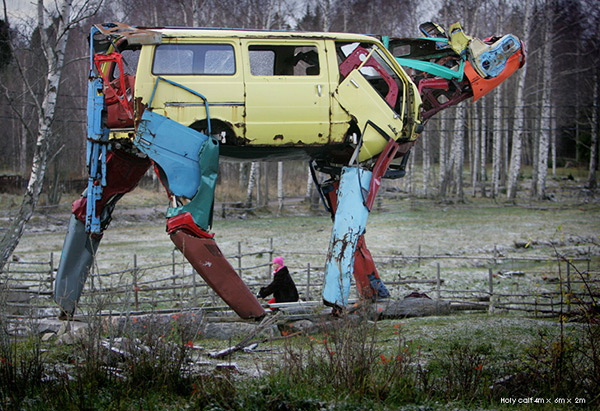 Giant cows made of car parts