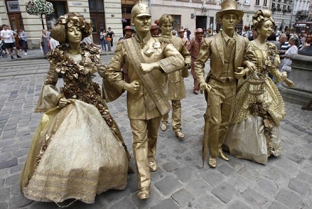 Statues walking in Lviv, Ukrain